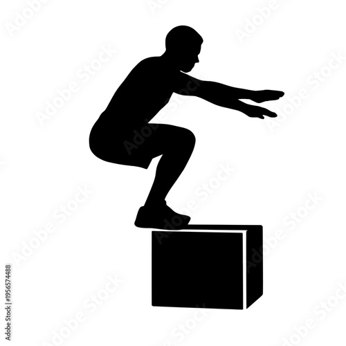 Black silhouette of a man jumping over a box