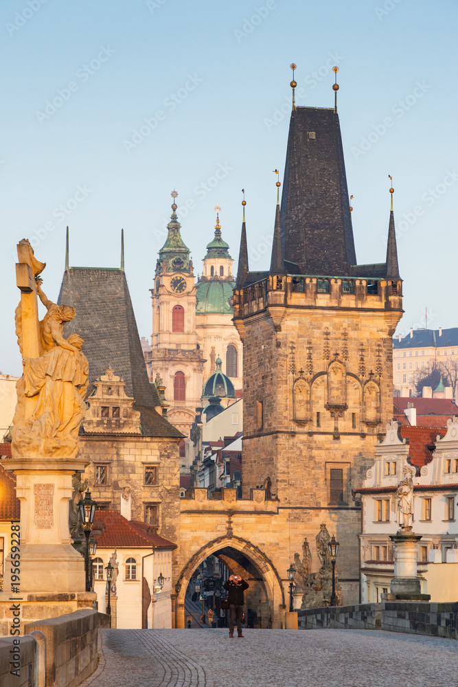 Fototapeta premium charles Bridge in Prague Czech Republic at sunrise with historic statues