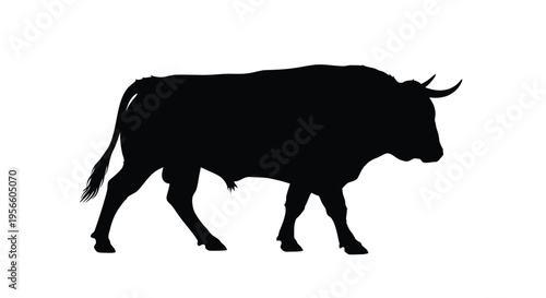 Silhouette of a majestic bull standing in profile against a white background