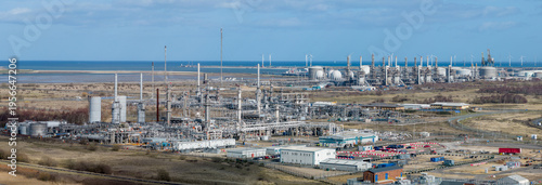 Oil Refinery near Middlesbrough and Hartlepool in the north east of England. Aerial view of the oil refinery and surrounding countryside and sea. 