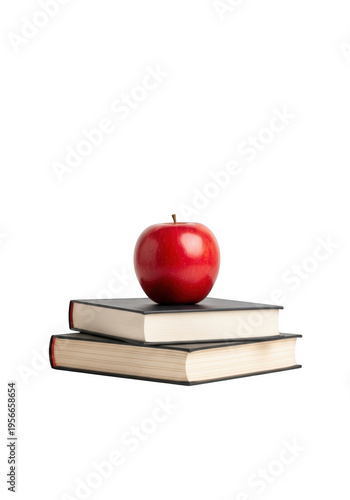 A bright red apple resting on a stack of two books isolated on transparent background