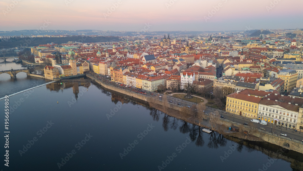 Fototapeta premium Sunset aerial view of Smetanovo nabrezi riverside in Prague, Cze