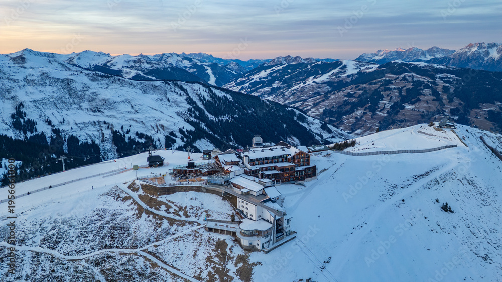 Fototapeta premium Sunset view of Hotel at Schmittenhohe ski resort in Austria
