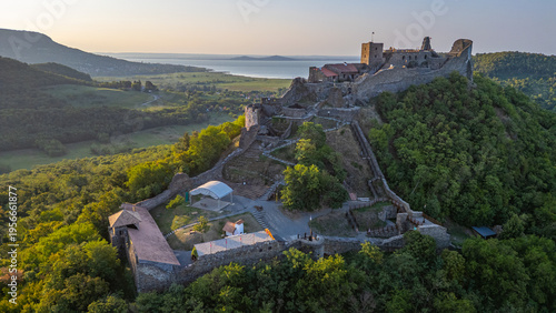 Photography Sunrise view of Szigliget castle in Hungary