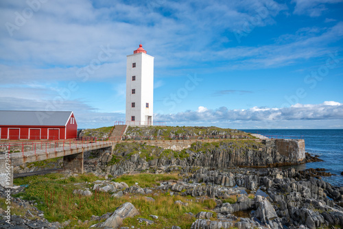 Kjølnes Lighthouse with Red Railing Pathway Leading Lines in Summer Blue Sky, Berlevåg, Finnmark, Norway