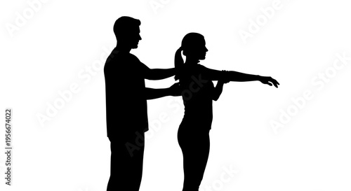 Silhouette of man and woman dancing together in love romantic couple motion