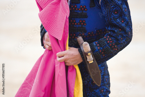 Fotografi A traditional Spanish Traje de Luces is a hand-embroidered silk suit with gold sequins, worn by bullfighters for elegance and bravery