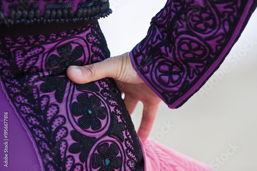 Bild auf Leinwand A traditional Spanish Traje de Luces is a hand-embroidered silk suit with gold sequins, worn by bullfighters for elegance and bravery