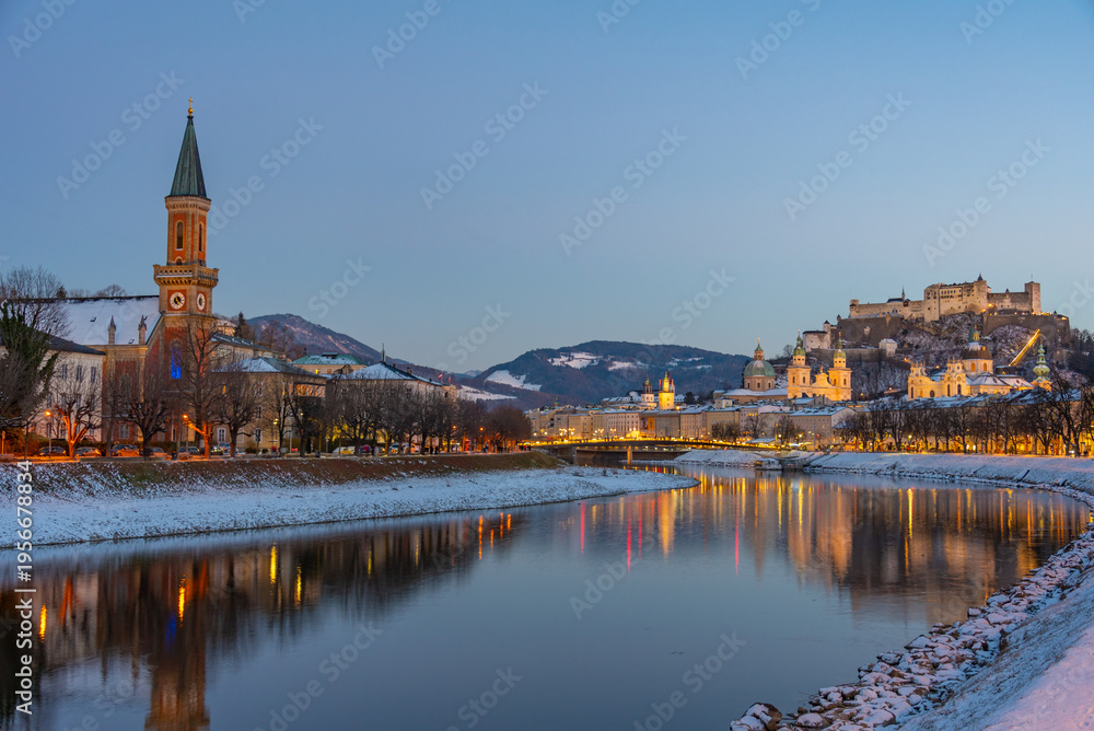 Fototapeta premium Sunset view of Hohensalzburg fortress overlooking Salzach river