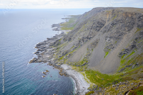 Dramatic View from Tanahorn Summit with Cliffs Dropping to Barents Sea, Berlevåg, Finnmark, Norway