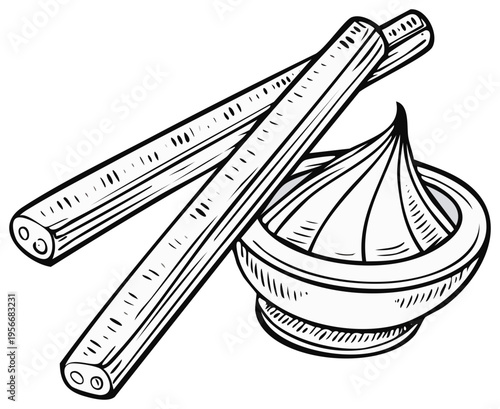 Traditional Chopsticks Resting on a Bowl of Swirled Dip or Sauce