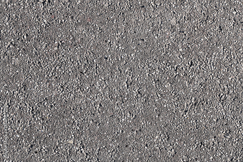 Rough concrete texture background with small stones. Construction material concept. Gray surface pattern. Industrial backdrop for design. Simple abstract wall or floor detail.