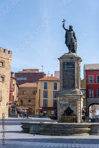 he 18th-century Revillagigedo Palace and King Pelayo monument at Plaza del Marques, overlooking the marina in Gijon, Asturias, Spain.