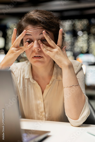 Bilde på lerret Restless sleepy businesswoman yawning in the office struggling to stay awake, dealing with sleep deprivation and work tension due to overload at night
