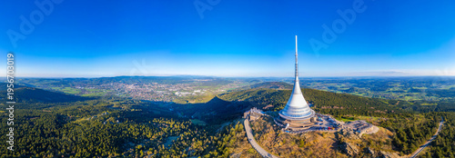 Aerial view of Jested tower during a sunny day near Liberec, Cze