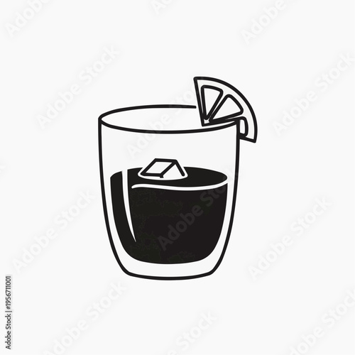 Glass of cola with ice and lime slice on a white background  