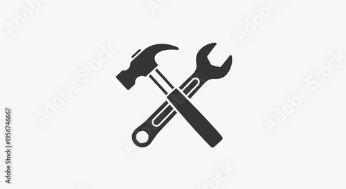 Hammer and wrench crossed tools.
