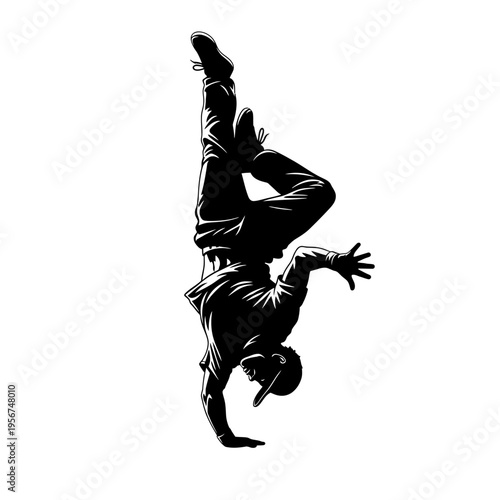 Breakdancer performs dynamic handstand flip on floor