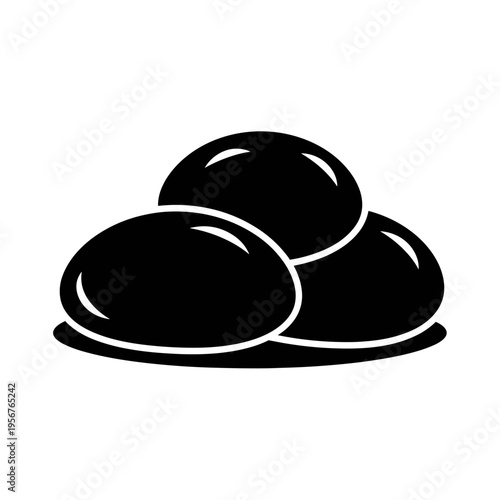 Three Black Coffee Beans on Plate.