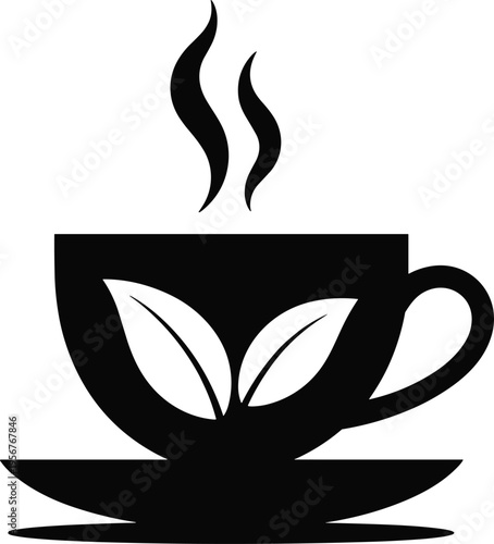 Steaming cup of tea with leaf design on a saucer