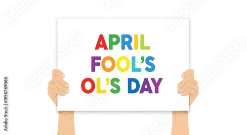 Hands holding a sign displaying the text april fool s day