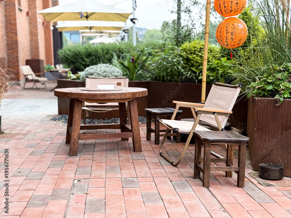 Fototapeta premium Charming Outdoor Space with Cozy Furniture for Relaxation and Gatherings