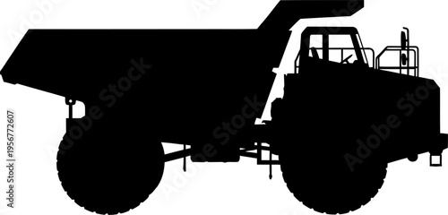 Giant mining dump truck hauling ore from a quarry