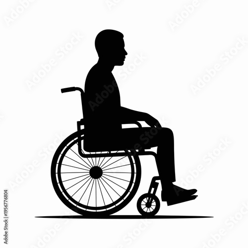 Man sitting in a wheelchair silhouette.