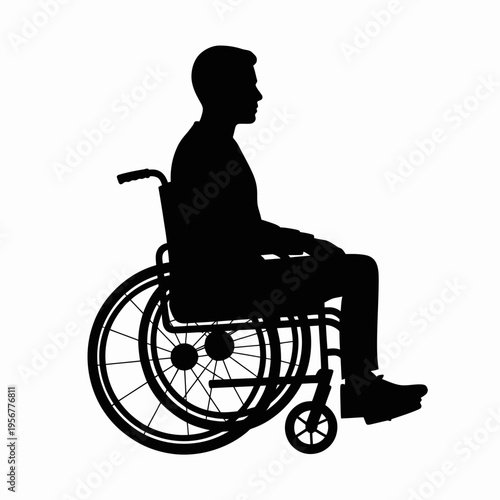 Silhouette of a man in wheelchair.