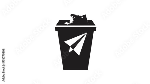 A black trash can with a paper airplane symbol and crumpled paper overflowing on a white background