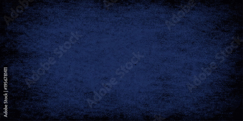 Dark blue grunge textured background with vintage rough surface and empty space for design