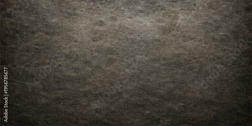 A dark grunge concrete wall background features a rough textured surface with an aged vintage pattern of dirty black and gray paint on a blank stone backdrop