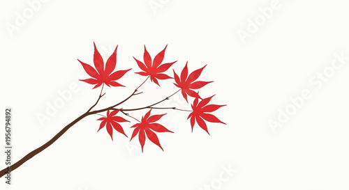 Red maple leaves on a branch.