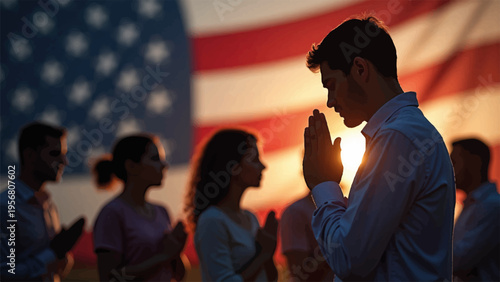 Diverse group praying with American flag background