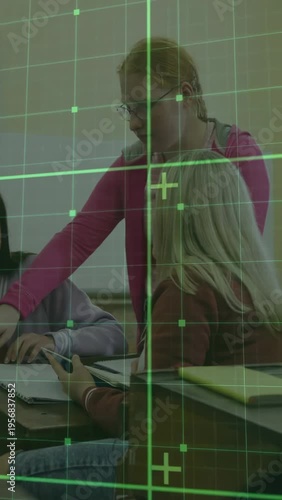 Vertical video: Student leaning, pointing, causing green grid overlay to mark notes, guiding class