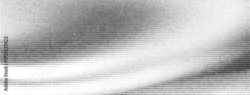 Abstract halftone pattern background with black dots of varying sizes