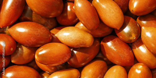 Texture banner of red cherry tomatoes, shiny natural surfaces as natural food pattern, seasonal farm produce background, clean eating concept, vegetarian lifestyle, sustainable agriculture, top view