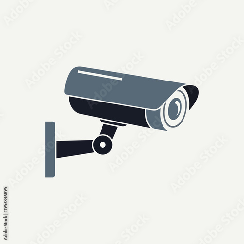 Security camera mounted on a wall, recording visuals for surveillance