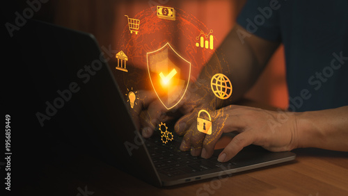 Person using a laptop for online banking and data protection. A glowing shield represents cybersecurity, financial safety, and secure transactions within a global network.