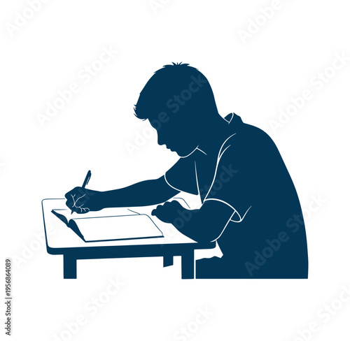 Silhouette of a boy sitting at a desk drawing with a stylus on a graphics tablet
