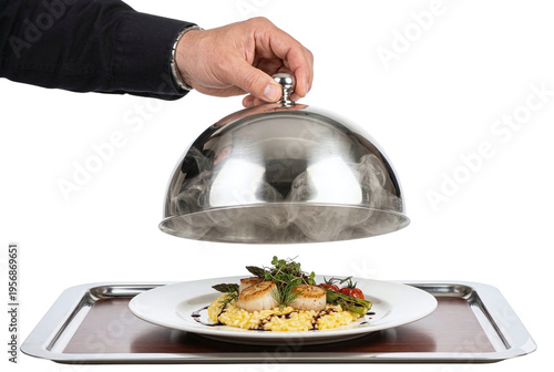 Waiter serving gourmet seared scallops and risotto