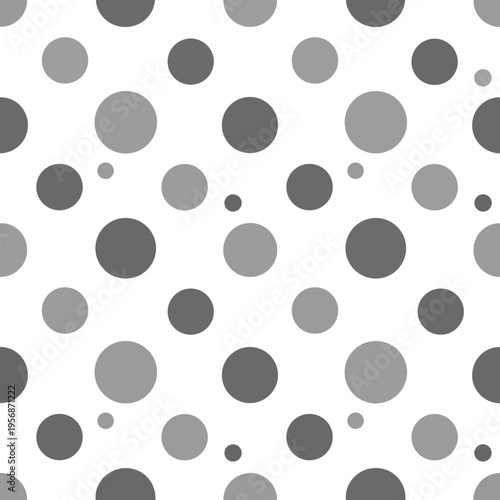 A seamless pattern of grey circles of varying sizes on a white background