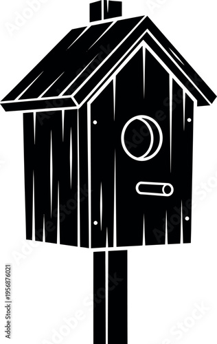 Simple black and white illustration of a wooden birdhouse on a pole