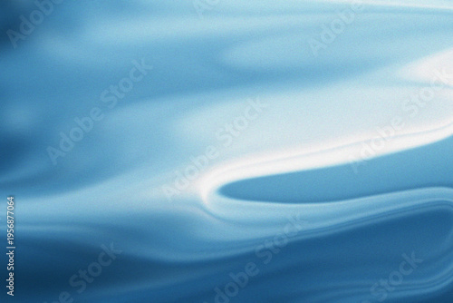 A blurry photo of a sunny winter scene with tree branches