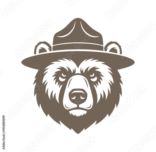 Brown bear wearing a hat  a bear in a ranger hat looking forward