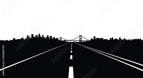 Road leading to a city skyline with a bridge black silhouette