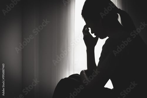 Shadow of a woman. She is depressed and depressed. There are problems. accumulated stress Relationship problems and emotional abuse.