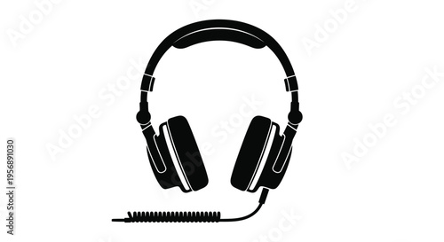 Black silhouette of over ear headphones with a coiled cable