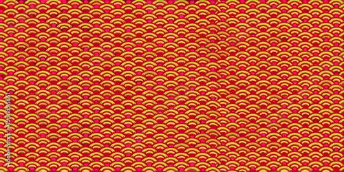 A vibrant repeating pattern of golden koi fish on a red background