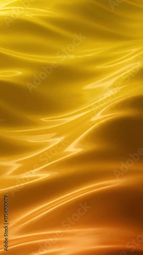 Smooth, flowing liquid surface with golden and orange hues